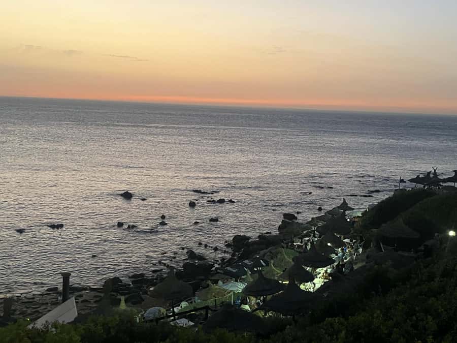 Tangier: Sunset, Tea, Sweets, Camel Ride, and Hercules Caves - Hercules Caves and the sea opening